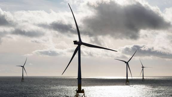 Offshore wind turbines in a calm sea