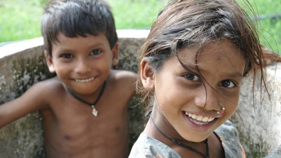 Two children smiling