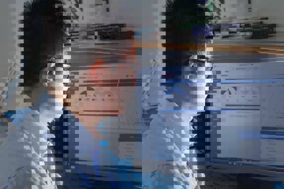 Man looking at computer monitor