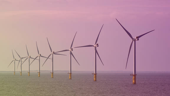 A row of offshore wind turbines