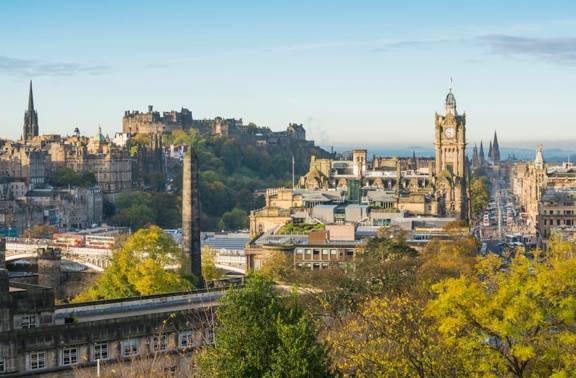 View of Edinburgh Castle from Calton Hill. Princes Street is towards the right and to the left the Castle is perched on its craggy perch