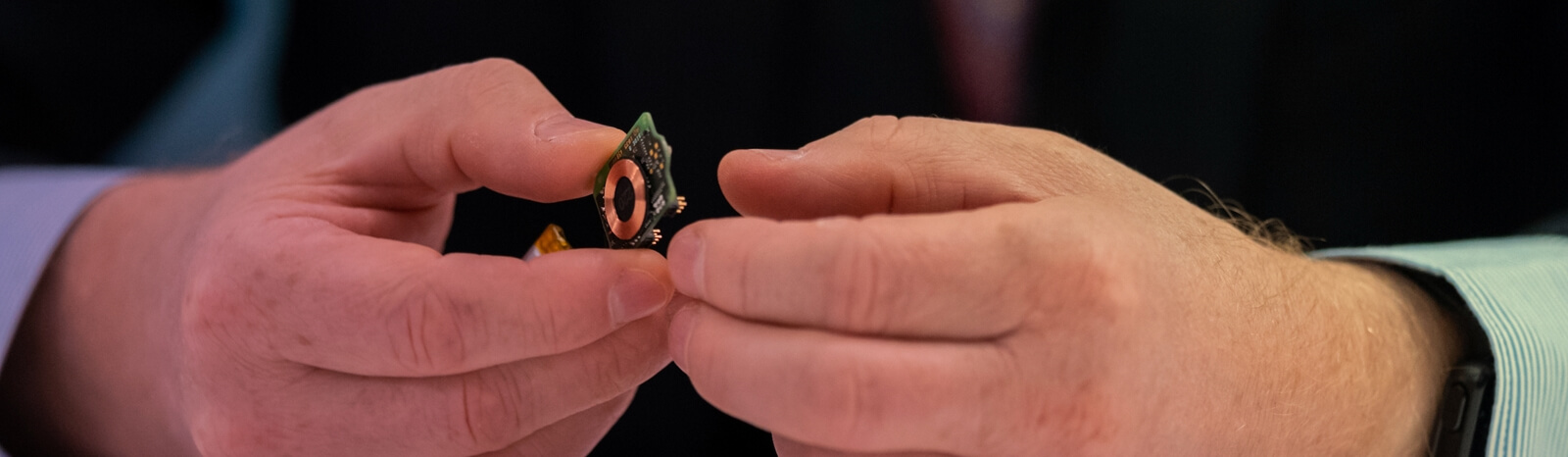 Man holding Enmovi's Motionsense technology