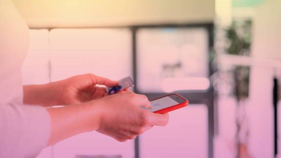 Person using banking app on mobile phone