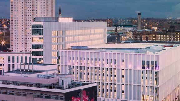 View across Glasgow rooftops at dusk