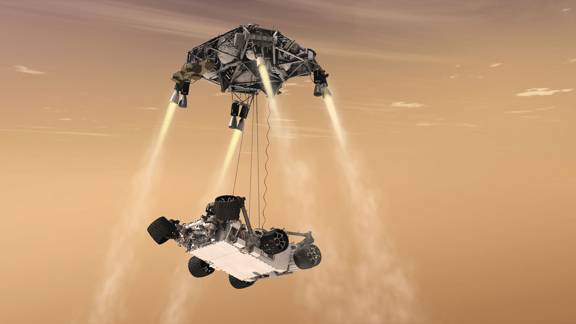 Artist's illustration of the NASA Mars 2020 Perserverance Mission shows the rover being lowered to the surface from the lander